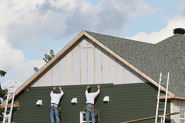 Professional Siding technician working in Doylestown, OH